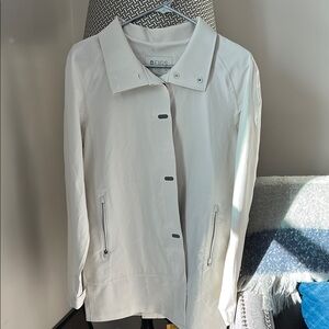 Off white FIGS rainproof jacket. New, never worn.